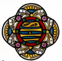 ELYGM:1979.2.5Stained glass quartrefoil panel with grisaille patterns in yellow, red and cream, central roundel with inscription © SGM