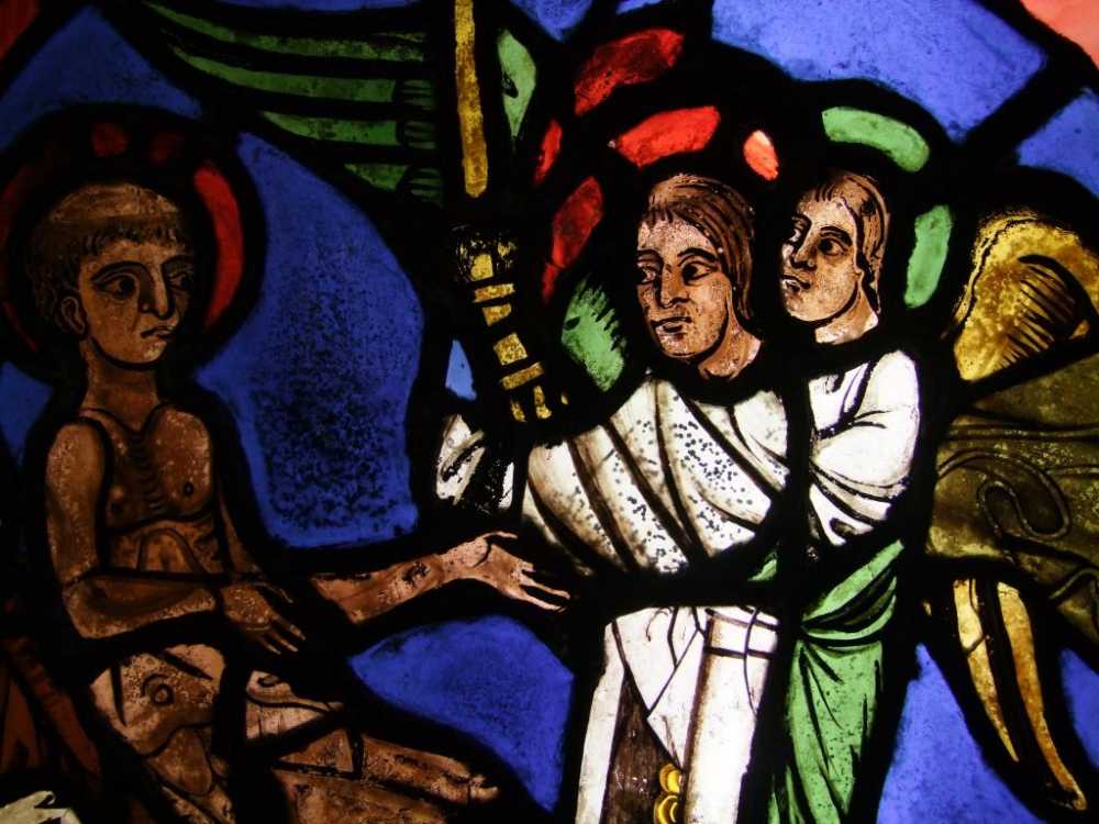 Detail of St Vincent being consoled by Angels, c.1220. On loan from REME Museum (ELYGM:L2003.7.2)  (c) Stained Glass Museum